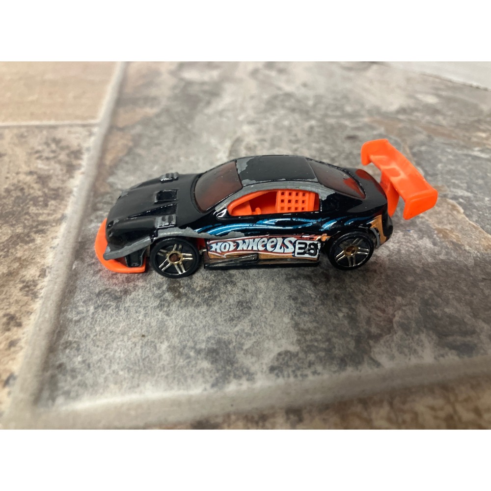Hot Wheels 1997 Pikes Peak Celica Black Orange Race Car
